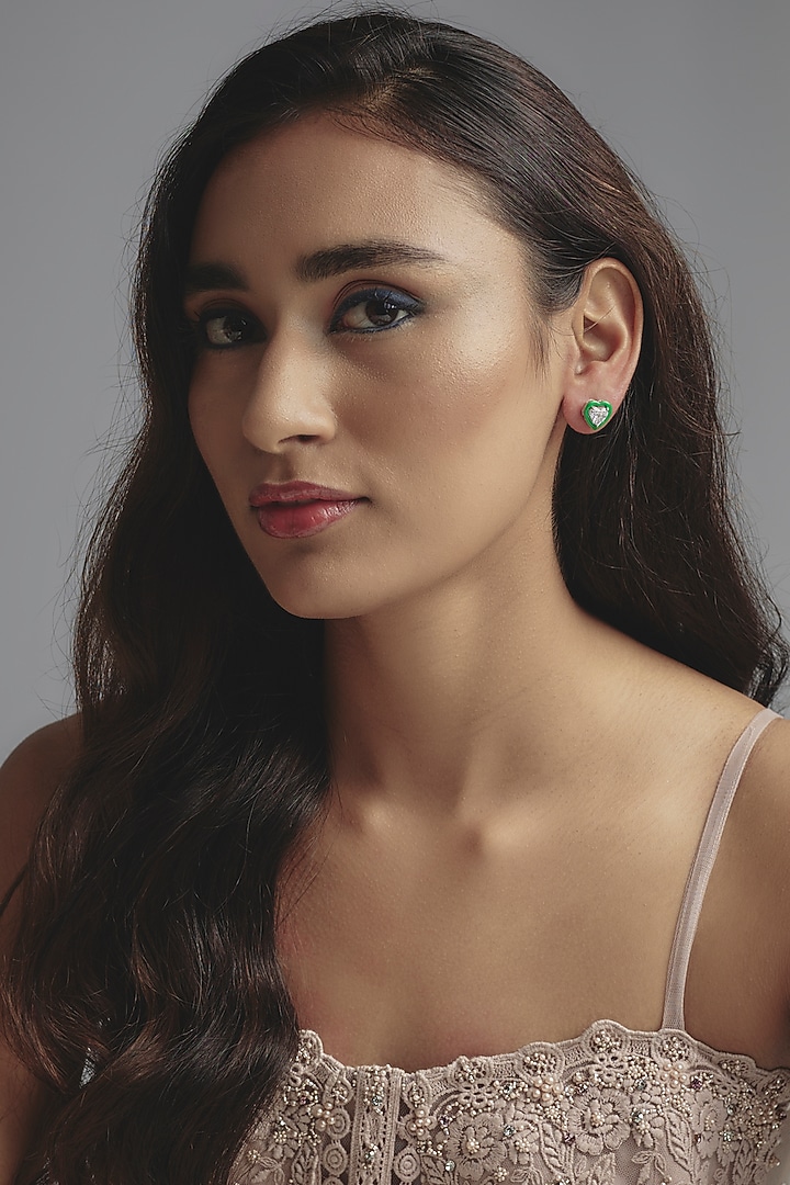 White Finish Swarovski Zirconia Enameled Heart Shaped Stud Earrings In Sterling Silver by Diosa Paris Jewellery at Pernia's Pop Up Shop