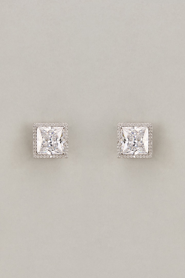 White Finish Princess Cut Swarovski Zirconia Stud Earrings In Sterling Silver by Diosa Paris Jewellery at Pernia's Pop Up Shop