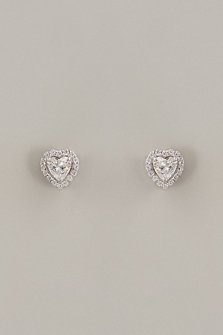White Finish Heart Cut Swarovski Zirconia Stud Earrings In Sterling Silver by Diosa Paris Jewellery at Pernia's Pop Up Shop