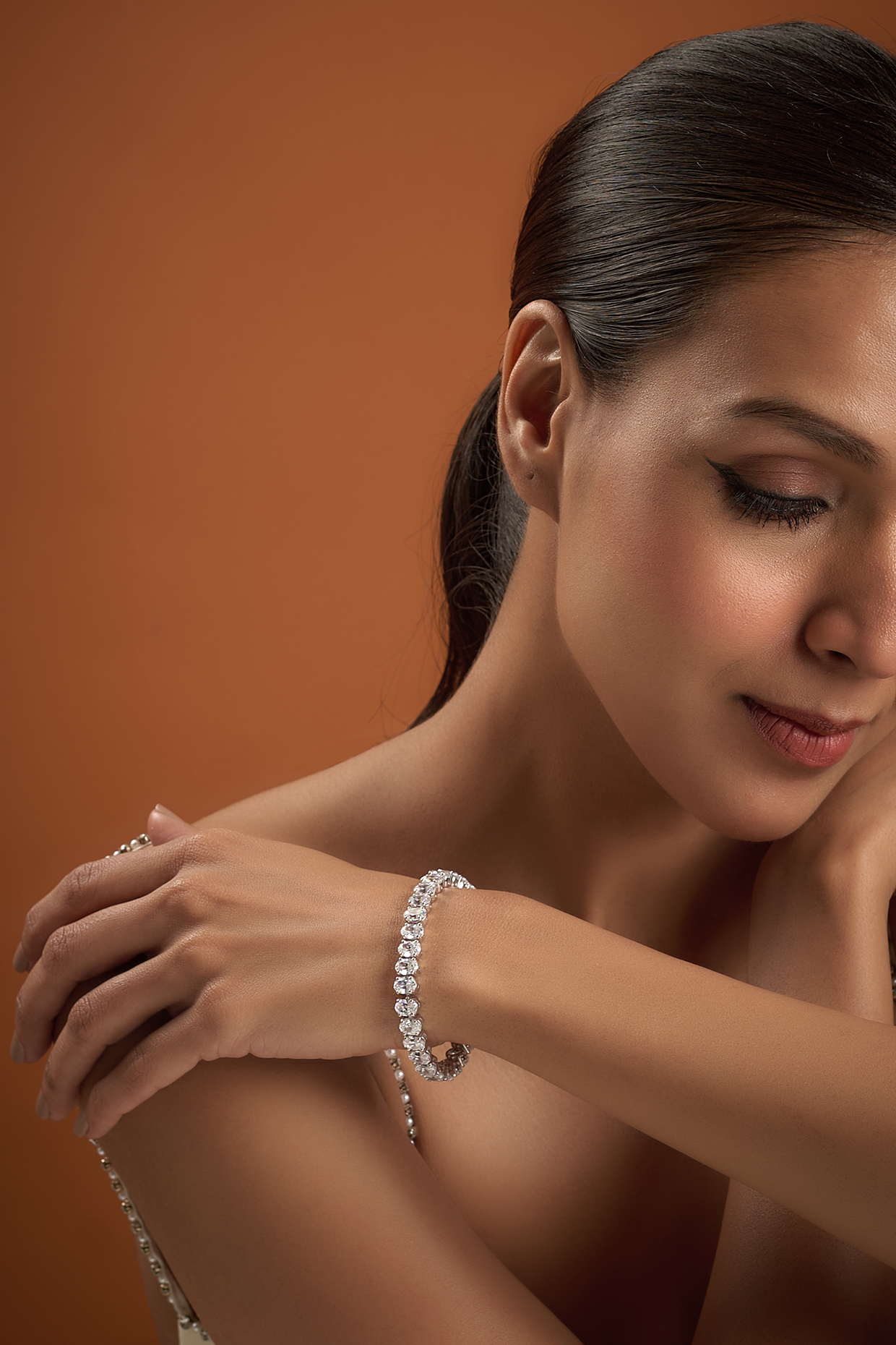 White Finish Swarovski Zirconia Bracelet In Sterling Silver by Diosa Paris Jewellery at Pernia's Pop Up Shop