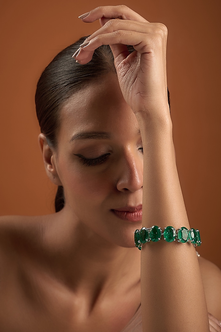 White Finish Oval Cut Emerald Synthetic Stone Bracelet In Sterling Silver by Diosa Paris Jewellery at Pernia's Pop Up Shop