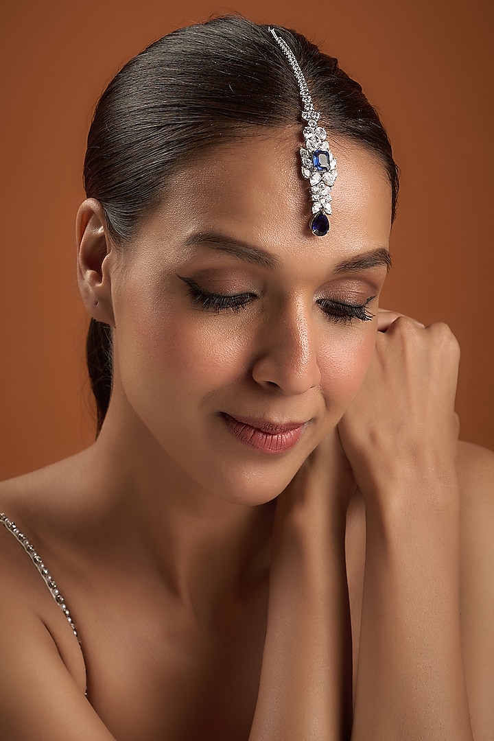 White Finish Oval Swarovski Zirconia & Sapphire Synthetic Stone Maang Tikka In Sterling Silver by Diosa Paris Jewellery