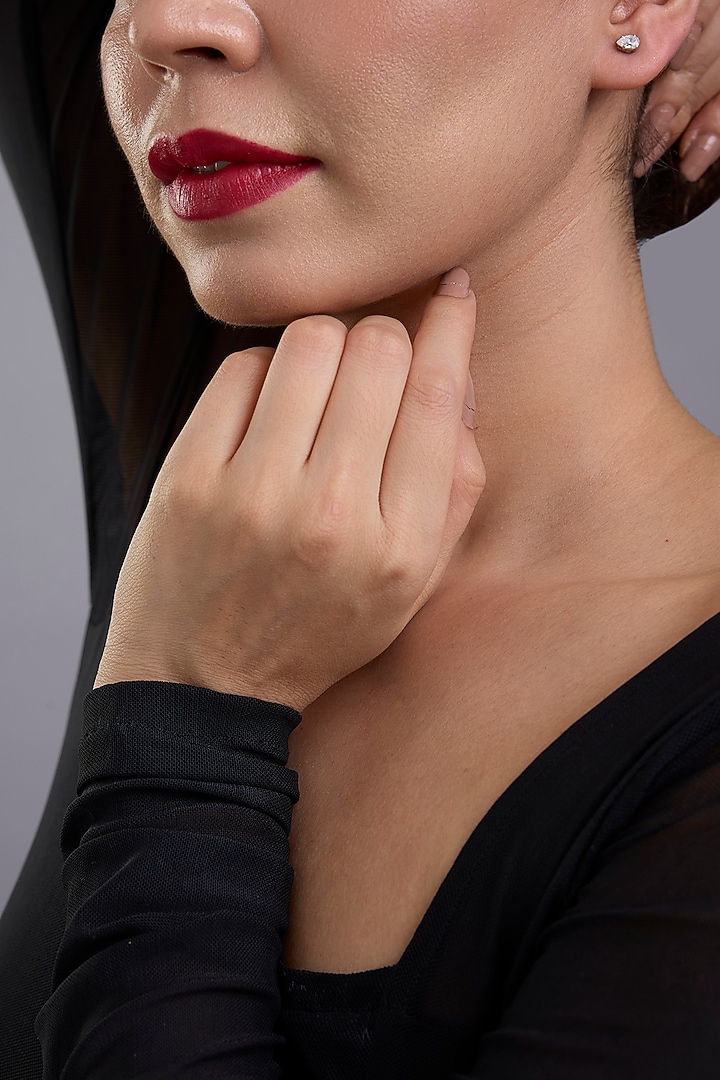 White Finish White Stone Stud Earrings In Sterling Silver by Diosa Paris Jewellery at Pernia's Pop Up Shop