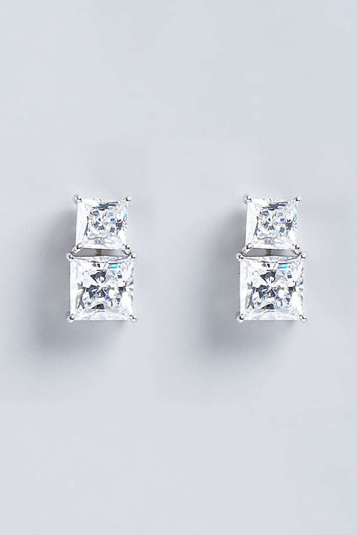 White Finish Princess-Cut Swarovski Zirconia Earrings In Sterling Silver by Diosa Paris Jewellery at Pernia's Pop Up Shop