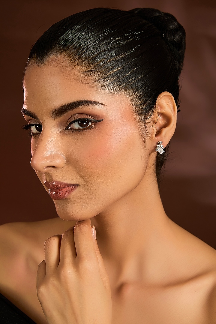 White Finish White Stone Stud Earrings In Sterling Silver by Diosa Paris Jewellery at Pernia's Pop Up Shop