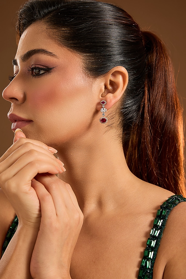 White Finish Zircon & Red Stone Dangler Earrings In Sterling Silver by Diosa Paris Jewellery at Pernia's Pop Up Shop