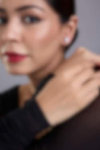 White Finish White Stone Stud Earrings In Sterling Silver by Diosa Paris Jewellery at Pernia's Pop Up Shop