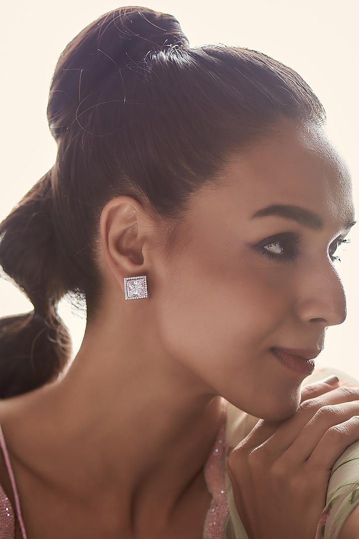 White Finish Stud Earrings In Sterling Silver by Diosa Paris Jewellery at Pernia's Pop Up Shop