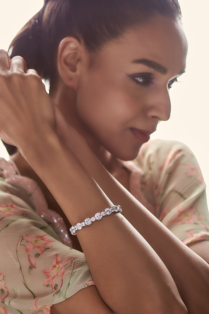 White Finish Swarovski Zirconia Bangle In 92.5 Sterling Silver by Diosa Paris Jewellery at Pernia's Pop Up Shop