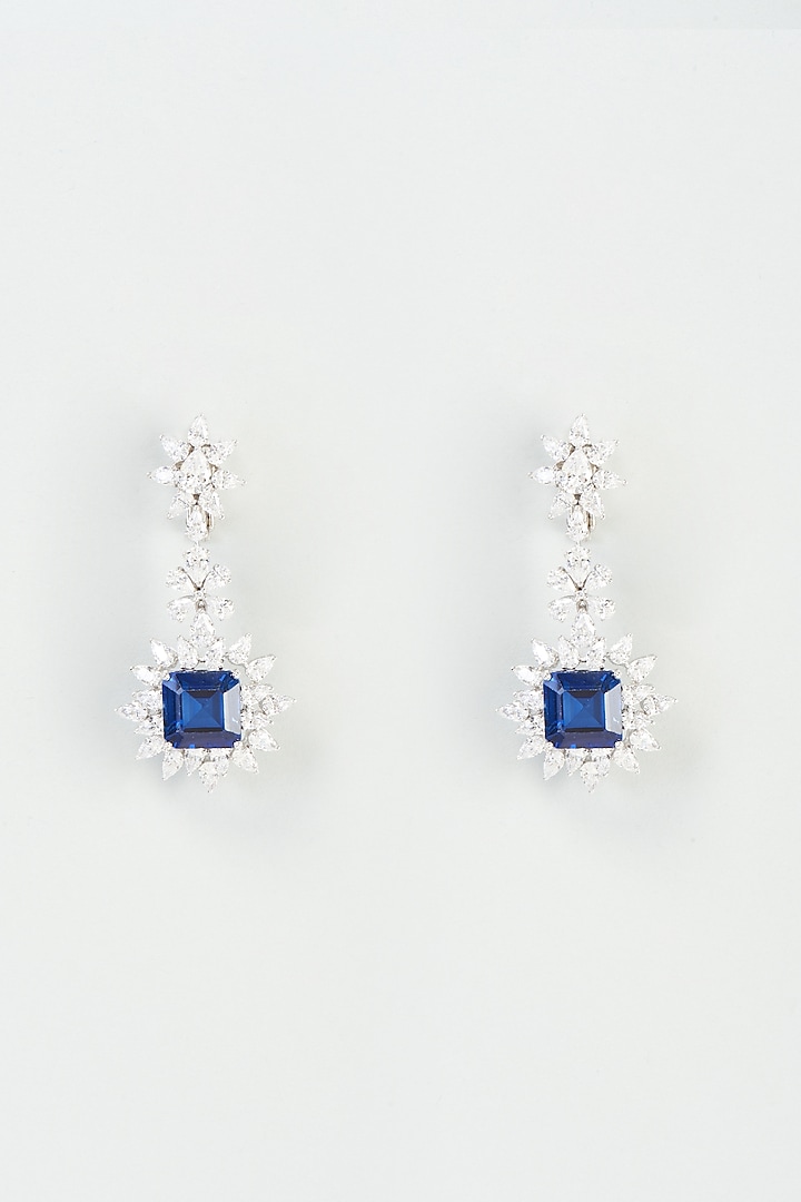 White Finish Blue Swarovski Zirconia Dangler Earrings In 92.5 Sterling Silver by Diosa Paris Silver Jewellery at Pernia's Pop Up Shop