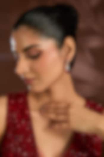 White Finish White & Red Stone Dangler Earrings In Sterling Silver by Diosa Paris Jewellery at Pernia's Pop Up Shop