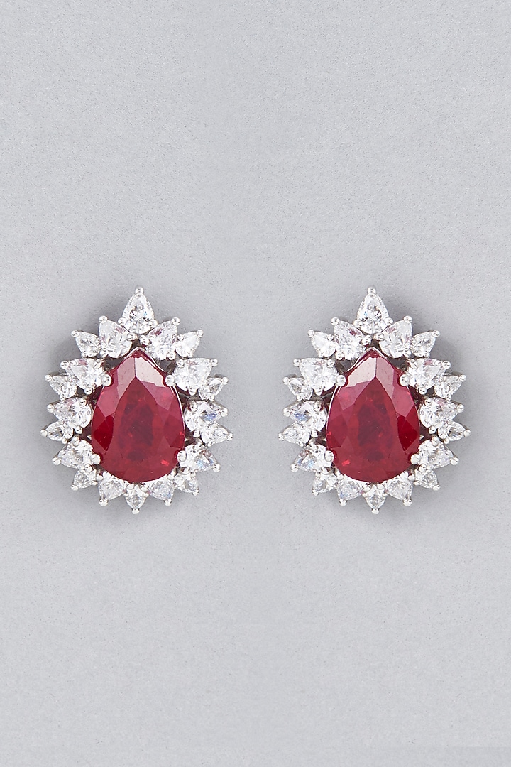 White Finish Stud Earrings With Red Synthetic Stones In Sterling Silver by Diosa Paris Jewellery at Pernia's Pop Up Shop