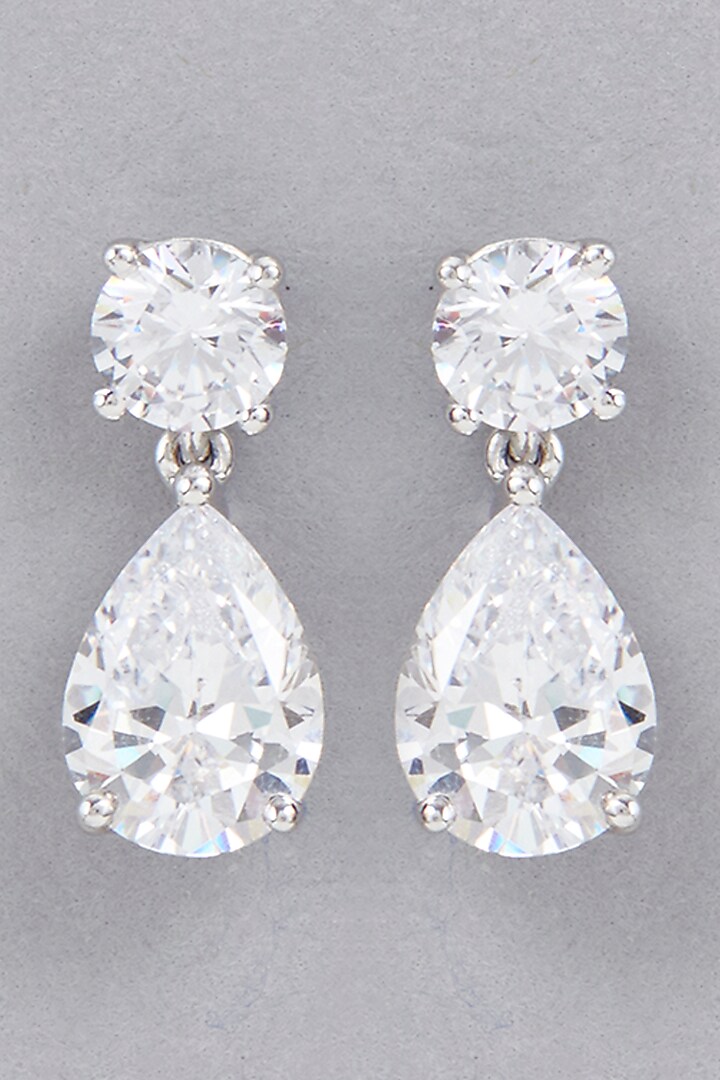 White Finish Swarovski Zirconia Stud Earrings In Sterling Silver by Diosa Paris Jewellery at Pernia's Pop Up Shop