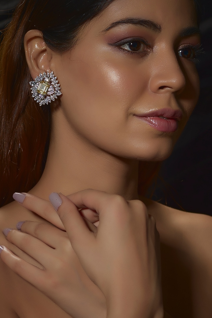 White Finish Swarovski Zirconia Stud Earrings In Sterling Silver by Diosa Paris Jewellery at Pernia's Pop Up Shop