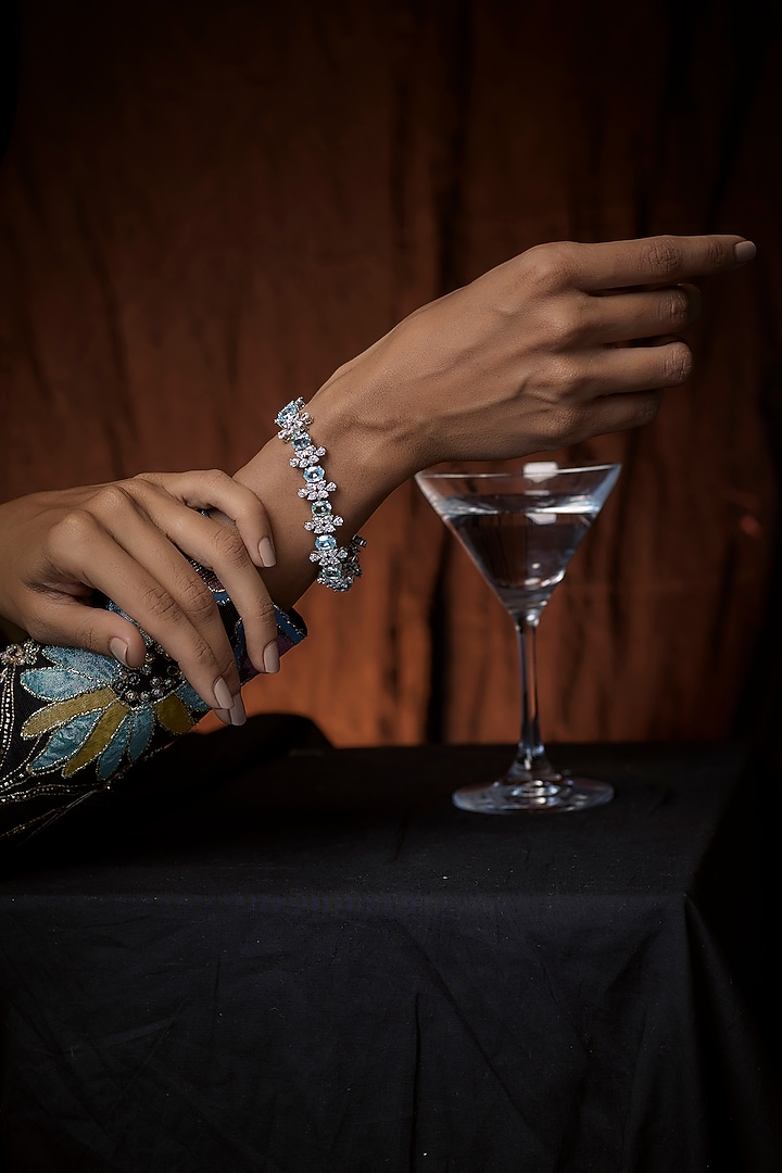 White Finish Blue & White Swarovski Zirconia Cuff Bracelet In Sterling Silver by Diosa Paris Jewellery at Pernia's Pop Up Shop
