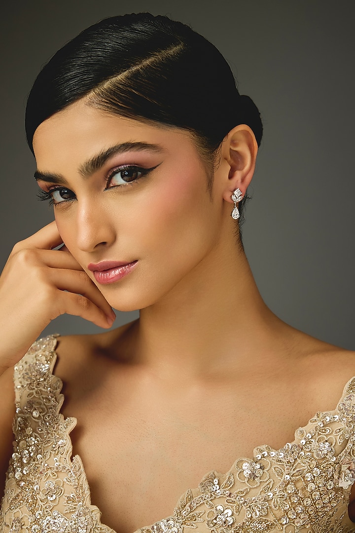 White Finish White Stone Stud Earrings In Sterling Silver by Diosa Paris Jewellery at Pernia's Pop Up Shop