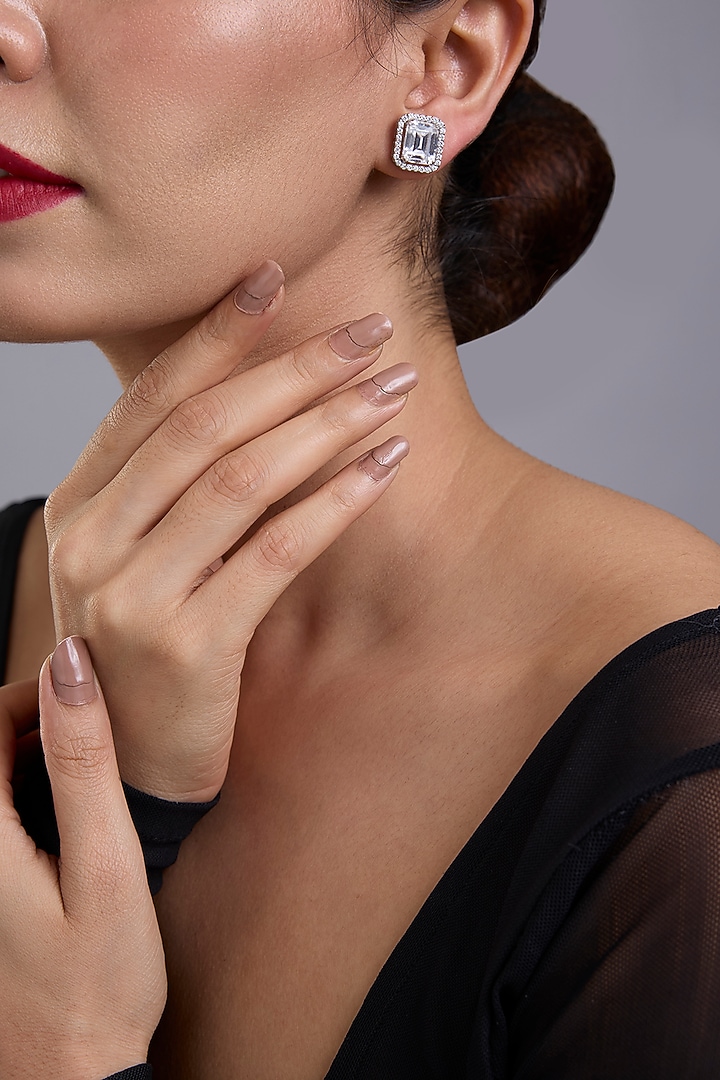 White Finish White Stone Stud Earrings In Sterling Silver by Diosa Paris Jewellery at Pernia's Pop Up Shop