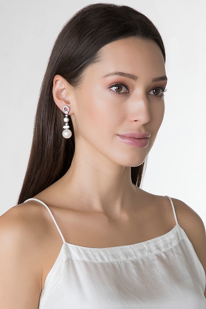White Finish Pearls & Swarovski Zirconia Earrings In Sterling Silver by Diosa Paris Jewellery at Pernia's Pop Up Shop