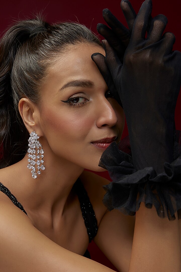 White Finish Swarovski Zircon Dangler Earrings In Sterling Silver by Diosa Paris Jewellery at Pernia's Pop Up Shop
