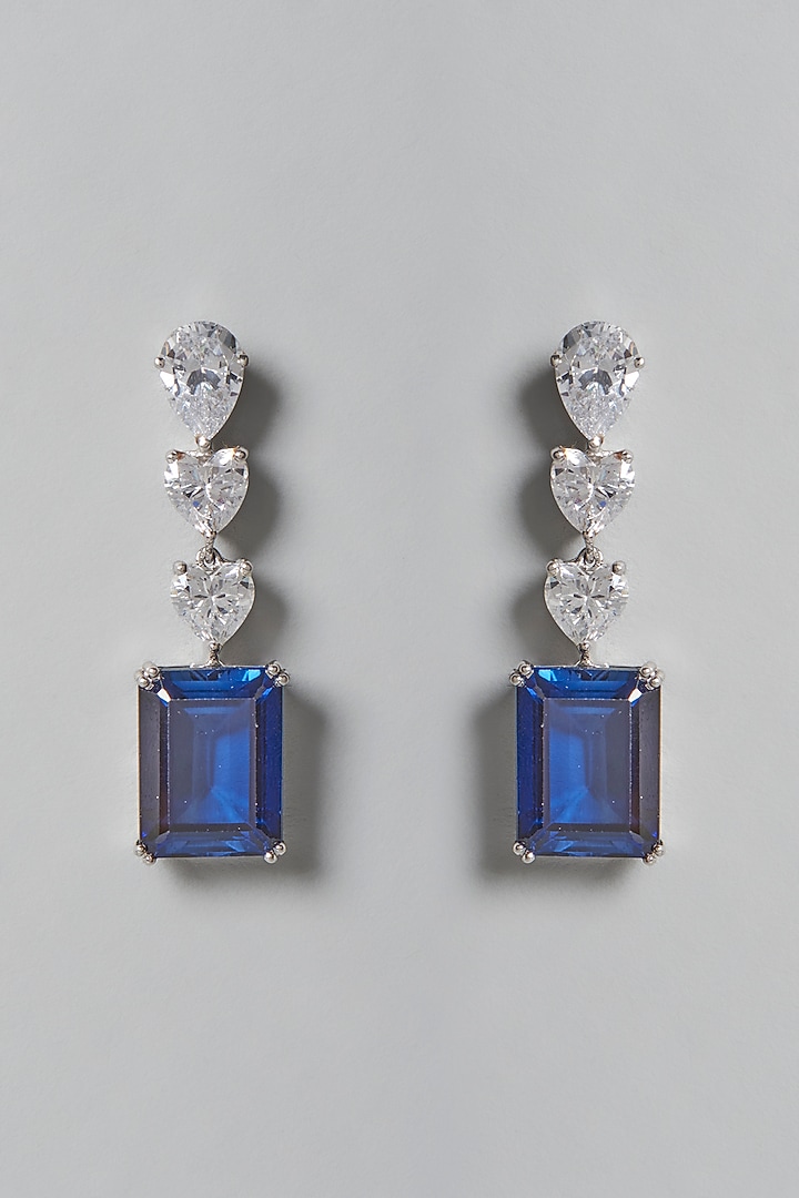 White Finish White & Blue Swarovski Zirconia Dangler Earrings In Sterling Silver by Diosa Paris Jewellery at Pernia's Pop Up Shop