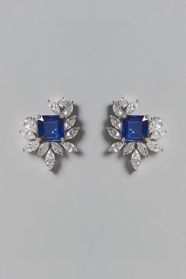 White Finish Blue & White Swarovski Zirconia Stud Earrings In Sterling Silver by Diosa Paris Jewellery at Pernia's Pop Up Shop