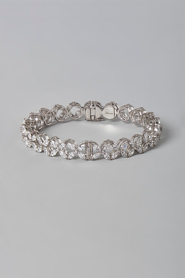 White Finish Swarovski Zirconia Floral Bangle In Sterling Silver by Diosa Paris Jewellery at Pernia's Pop Up Shop