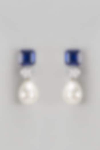 White Finish Swarovski & Synthetic Blue Stone Dangler Earrings In Sterling Silver by Diosa Paris Jewellery at Pernia's Pop Up Shop