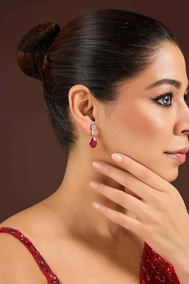 White Finish Zircon & Ruby Stud Earrings In Sterling Silver by Diosa Paris Jewellery at Pernia's Pop Up Shop
