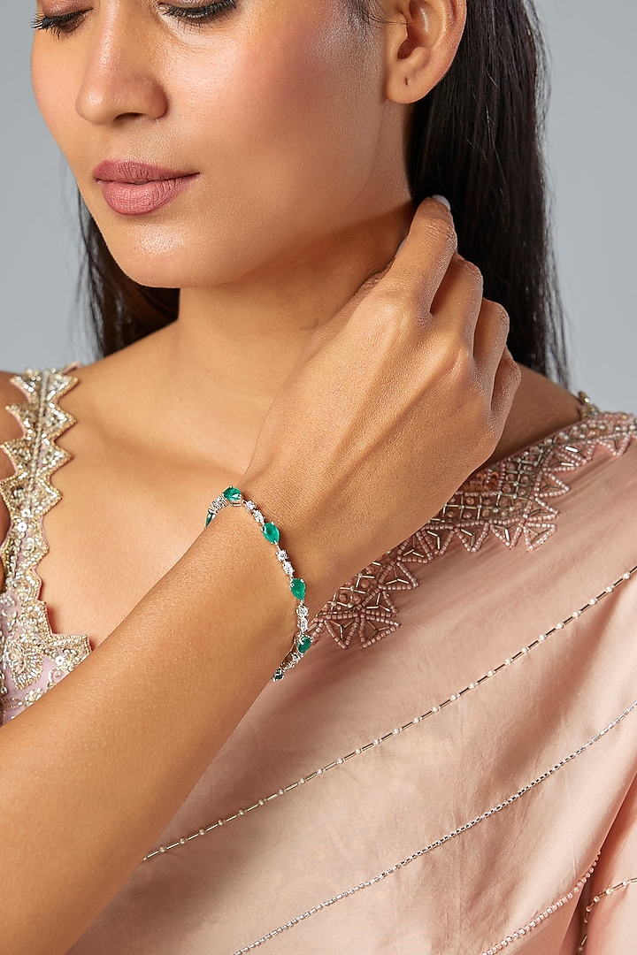 White Finish Zircon & Emerald Stone Tennis Bracelet In Sterling Silver by Diosa Paris Jewellery at Pernia's Pop Up Shop