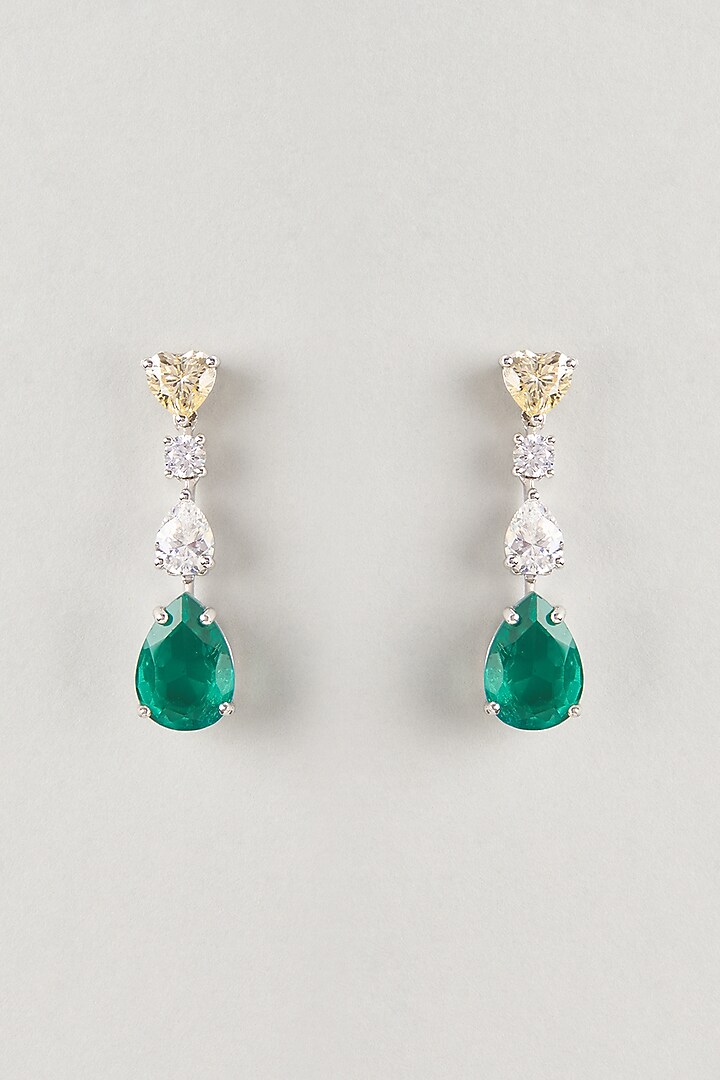 White Finish Zircon & Emerald Stone Dangler Earrings In Sterling Silver by Diosa Paris Jewellery at Pernia's Pop Up Shop