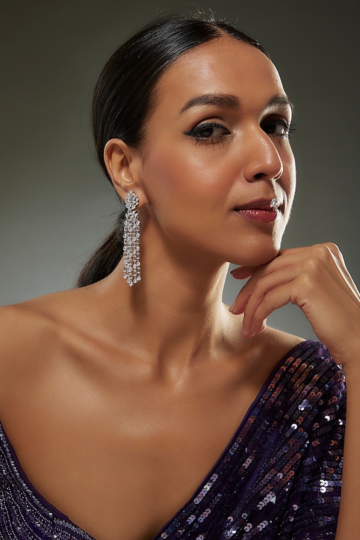 White Finish Swarovski Zircon Dangler Earrings In Sterling Silver by Diosa Paris Jewellery at Pernia's Pop Up Shop