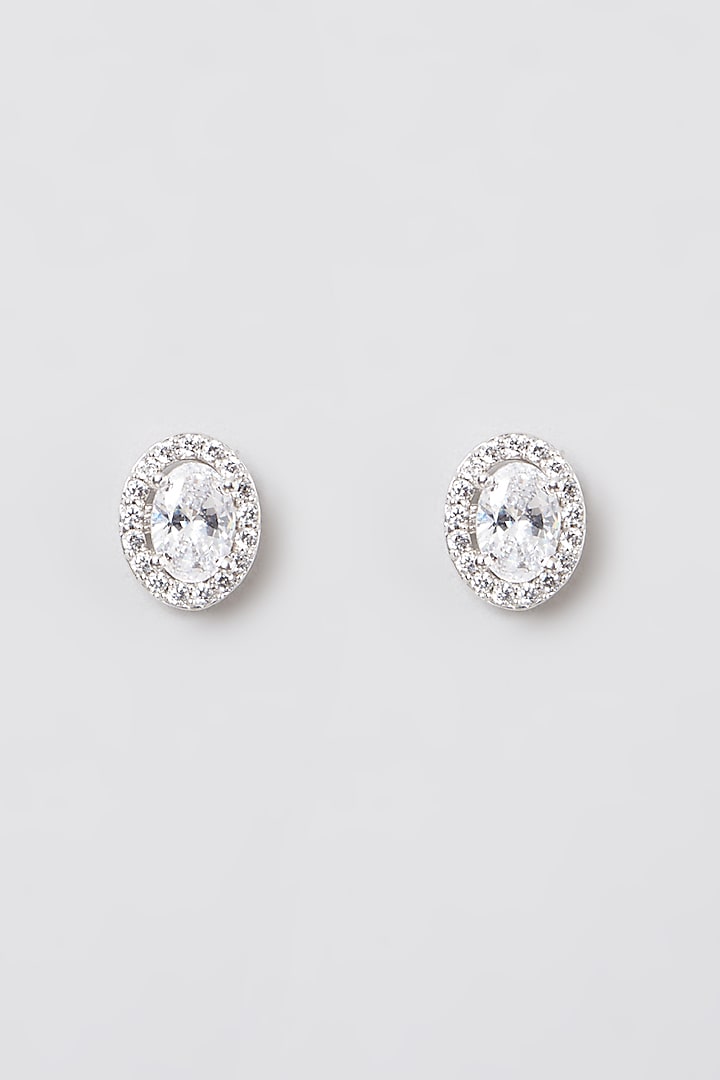 White Rhodium Finish Swarovski Zirconia Oval-Cut Stud Earrings In 92.5 Sterling Silver by Diosa Paris Jewellery at Pernia's Pop Up Shop