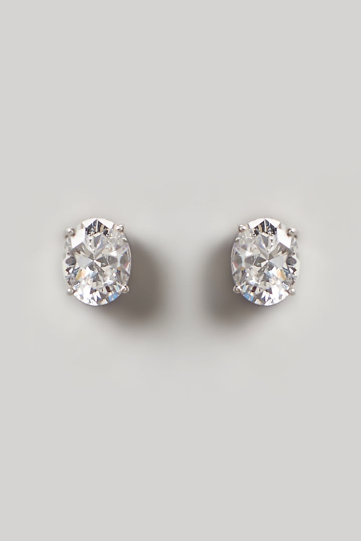 White Finish Swarovski Zirconia Stud Earrings In Sterling Silver by Diosa Paris Jewellery at Pernia's Pop Up Shop