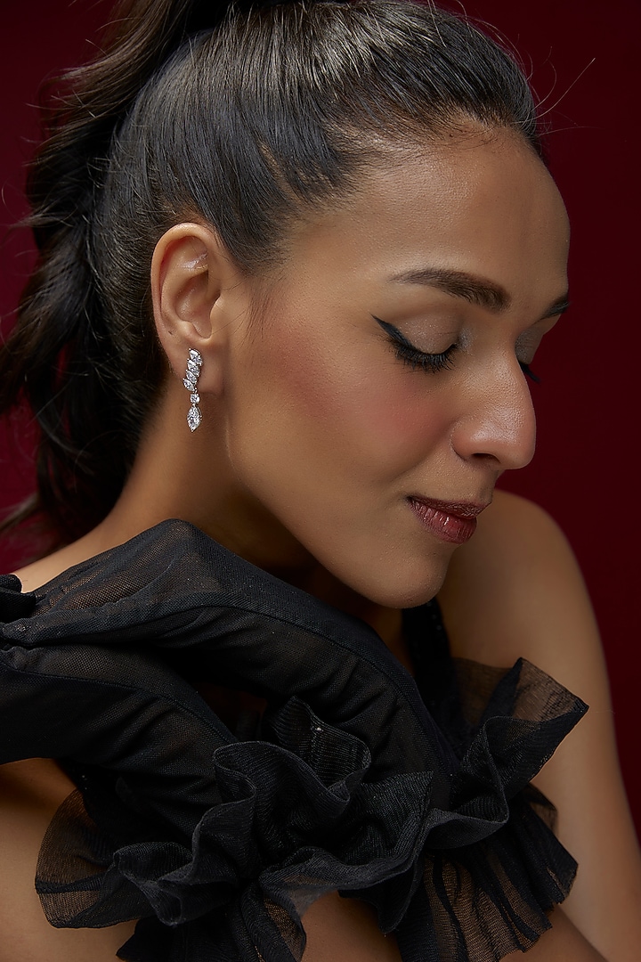 White Finish Swarovski Zircon Dangler Earrings In Sterling Silver by Diosa Paris Jewellery at Pernia's Pop Up Shop