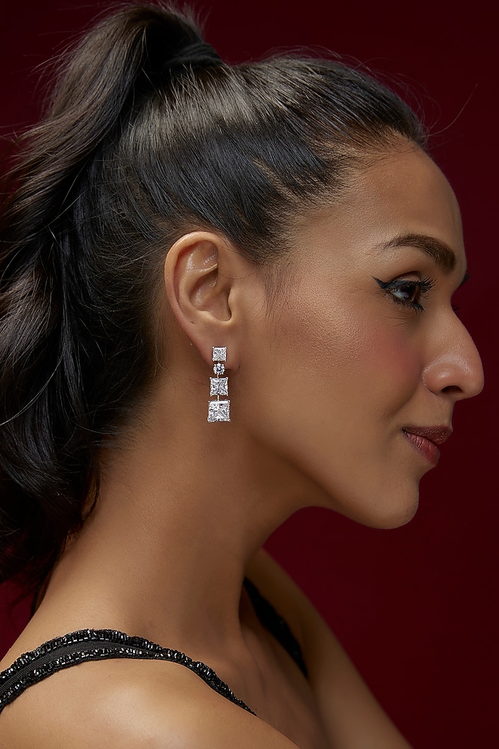 White Finish Swarovski Zircon Dangler Earrings In Sterling Silver by Diosa Paris Jewellery at Pernia's Pop Up Shop