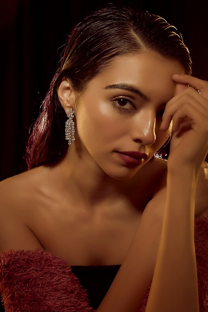 White Finish Swarovski Zirconia Dangler Earrings In Sterling Silver by Diosa Paris Jewellery at Pernia's Pop Up Shop