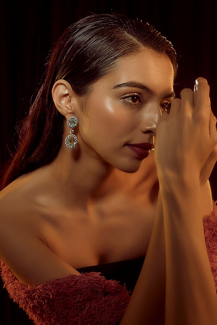 White Finish Swarovski Zirconia Dangler Earrings In Sterling Silver by Diosa Paris Jewellery at Pernia's Pop Up Shop