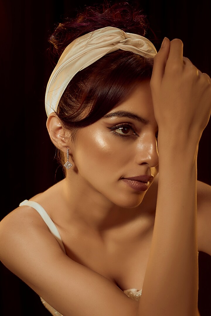White Finish Swarovski Zirconia Dangler Earrings In Sterling Silver by Diosa Paris Jewellery at Pernia's Pop Up Shop