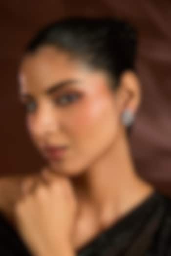 White Finish White Stone Stud Earrings In Sterling Silver by Diosa Paris Jewellery at Pernia's Pop Up Shop