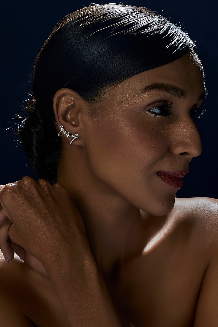 White Finish Oval Cut Swarovski Zirconia Earclips In Sterling Silver by Diosa Paris Jewellery at Pernia's Pop Up Shop