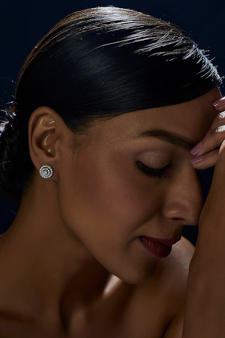 White Finish Oval Cut Swarovski Zirconia Stud Earrings In Sterling Silver by Diosa Paris Jewellery at Pernia's Pop Up Shop