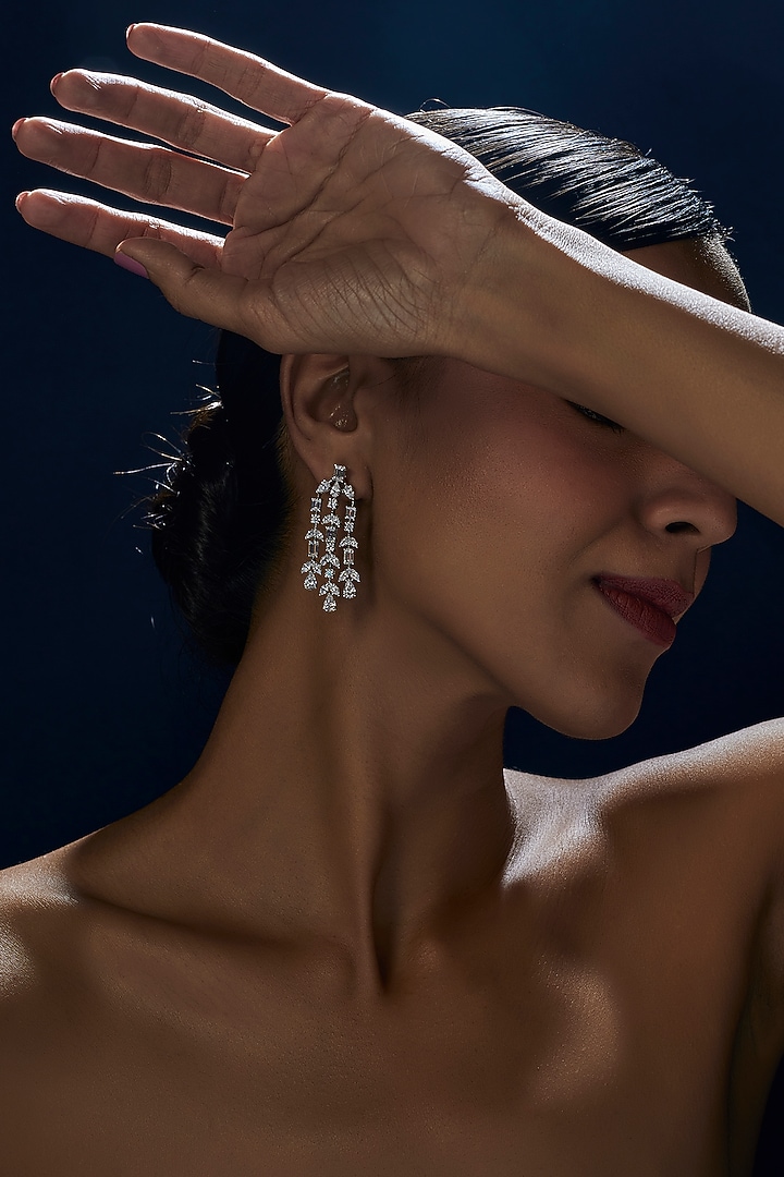 White Finish Swarovski Zirconia Dangler Earrings In Sterling Silver by Diosa Paris Jewellery at Pernia's Pop Up Shop