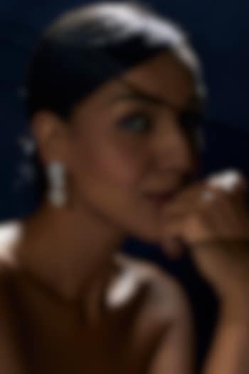 White Finish Swarovski Zirconia Dangler Earrings In Sterling Silver by Diosa Paris Jewellery at Pernia's Pop Up Shop