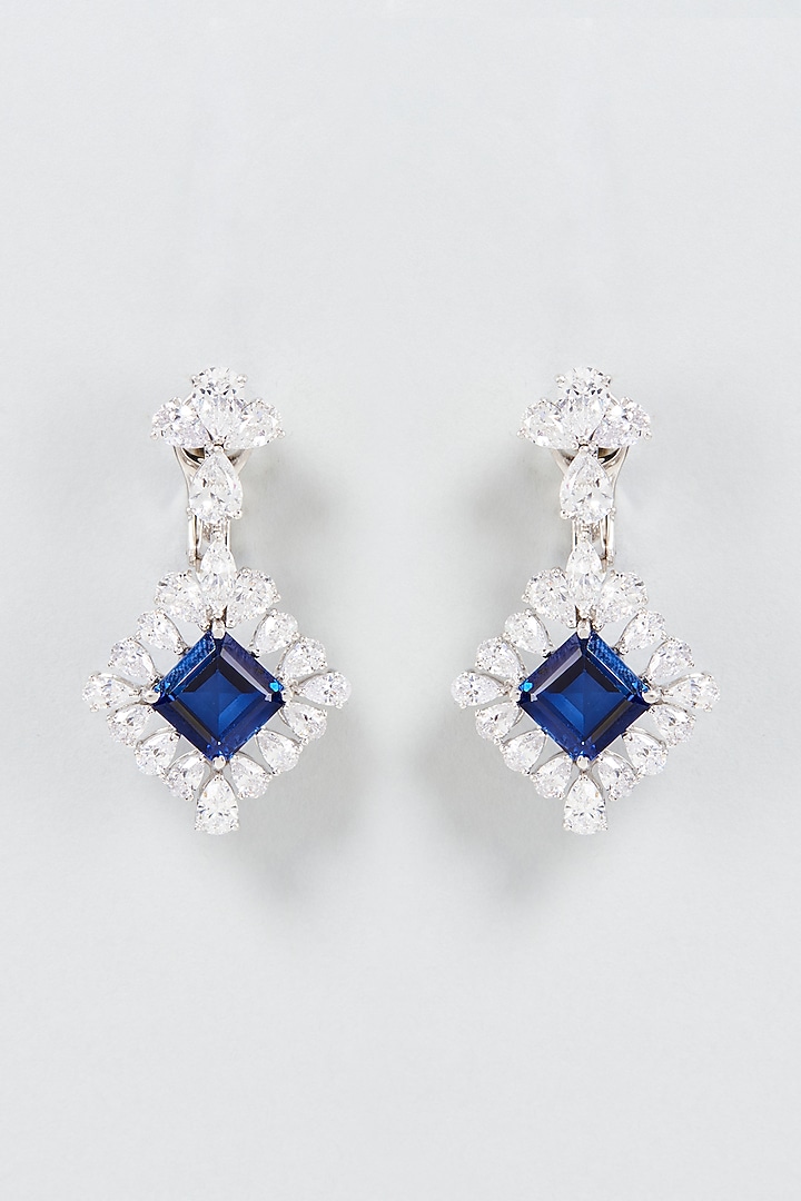 White Finish Princess Cut Blue Stone Dangler Earrings In Sterling Silver by Diosa Paris Jewellery at Pernia's Pop Up Shop