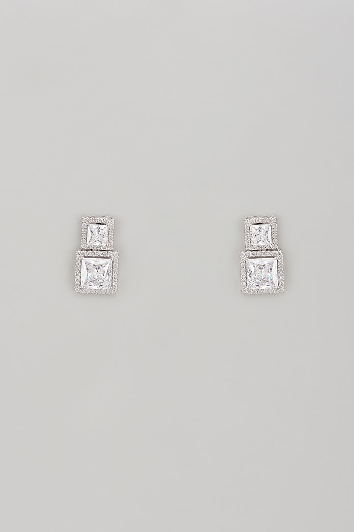 White Finish Swarovski Zircon Dangler Earrings In Sterling Silver by Diosa Paris Jewellery at Pernia's Pop Up Shop