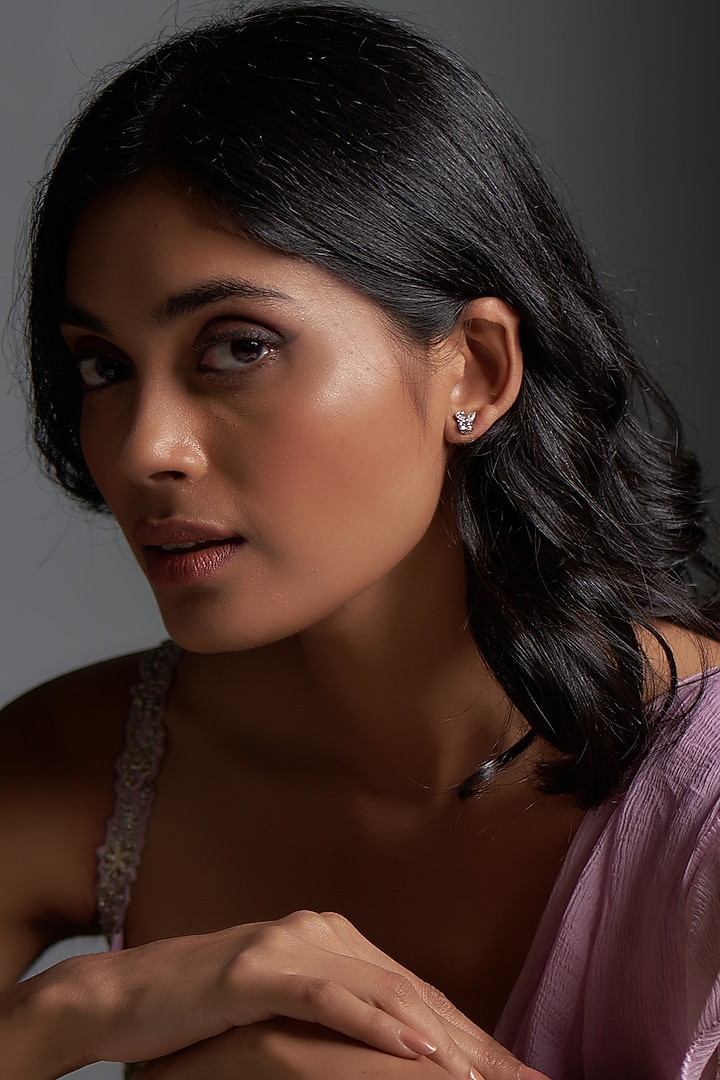 White Finish Swarovski Zirconia Stud Earrings In Sterling Silver by Diosa Paris Jewellery at Pernia's Pop Up Shop