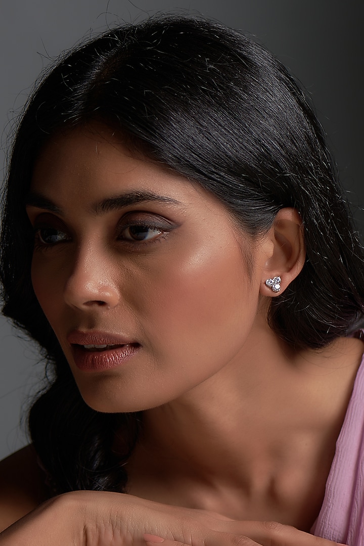 White Finish Swarovski Zirconia Stud Earrings In Sterling Silver by Diosa Paris Jewellery at Pernia's Pop Up Shop