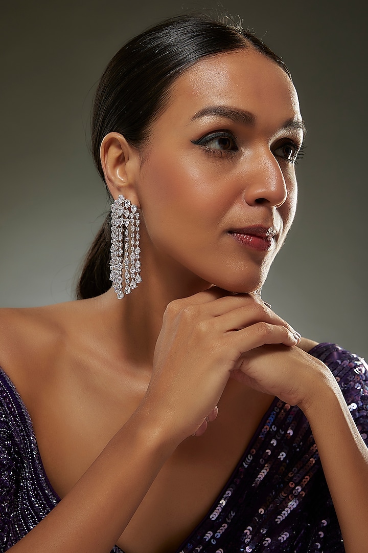 White Finish Swarovski Zircon Dangler Earrings In Sterling Silver by Diosa Paris Jewellery at Pernia's Pop Up Shop