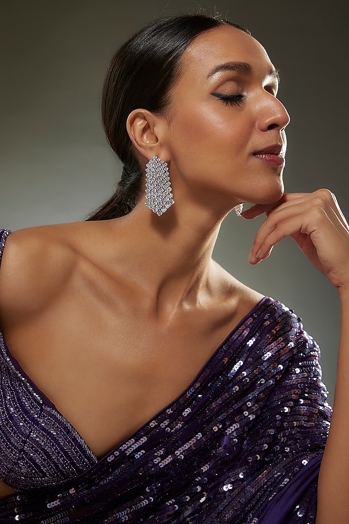 White Finish Swarovski Zircon Dangler Earrings In Sterling Silver by Diosa Paris Jewellery at Pernia's Pop Up Shop