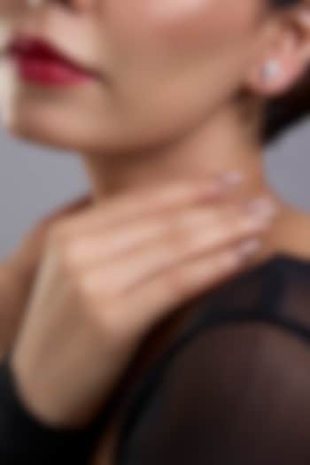 White Finish White Stone Stud Earrings In Sterling Silver by Diosa Paris Jewellery at Pernia's Pop Up Shop